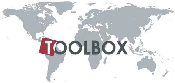 Toolbox logo with grey world map in the background