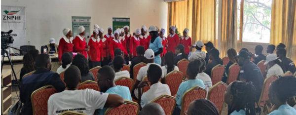 The women from the church singing at the WAAW launch event.